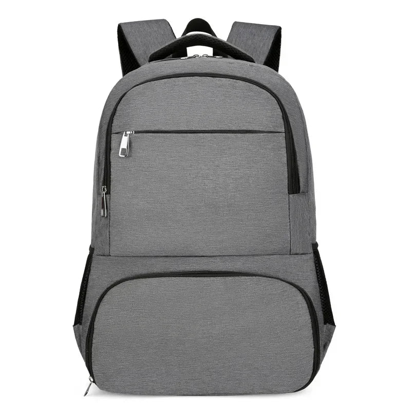 Grauer Unisex Anti-Diebstahl Rucksack mit integriertem Lunchfach, perfekt für Pendler & Tagesausflüge.