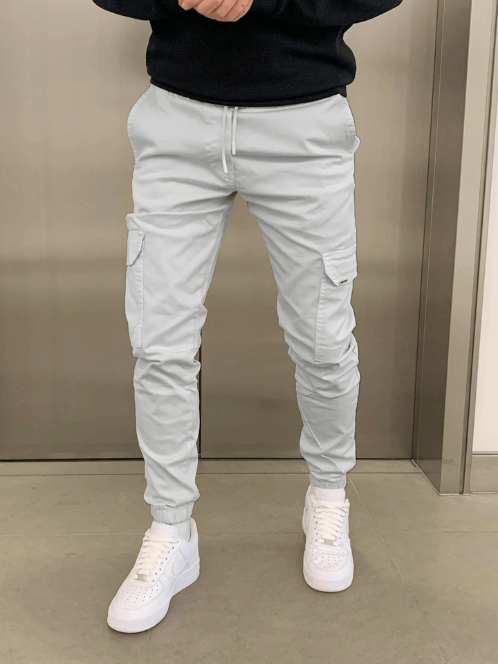 Trendige Unisex Cargo Jogger Hose. Komfortable Freizeithose für urbanen Stil, praktisch mit Taschen & sportlichem Touch.