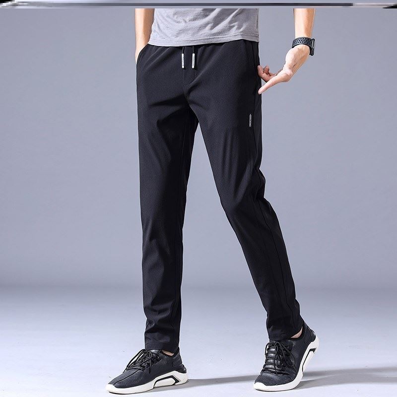 Unisex Freizeithose Jogger schwarz mit Kordelzug, bequem & locker für Alltag & Freizeit. Stilvolle Herren- & Damenhose.