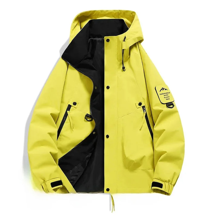Detail der wasserdichten Unisex Kapuzen-Winterjacke. Atmungsaktives Material für Skifahren, Wandern & Schnee.