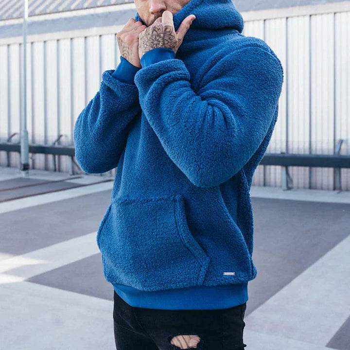 Gemütlicher Unisex Winter Hoodie mit Sherpa-Futter in Schwarz, ideal für Wärme & Komfort an kalten Tagen.
