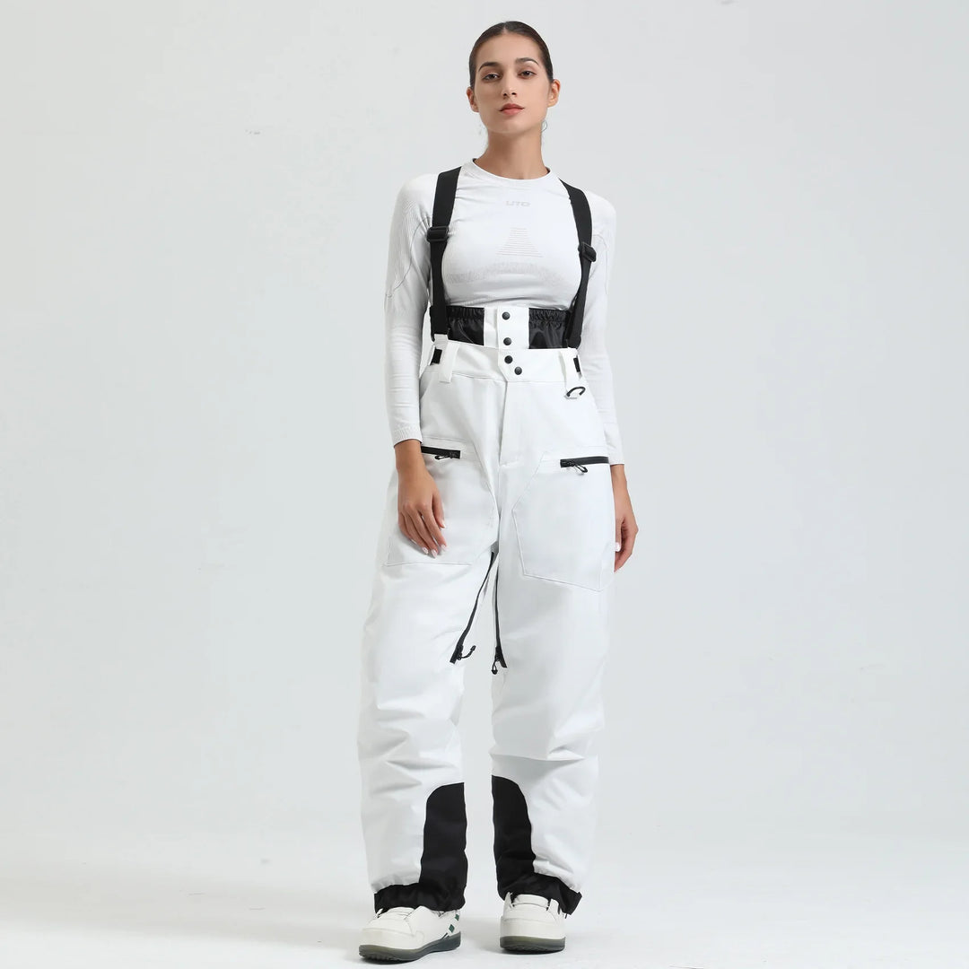 Effektiver Kälteschutz: Wasserdichte Unisex Skihose mit Hosenträgern, ideal für Herren und Damen im Schnee.