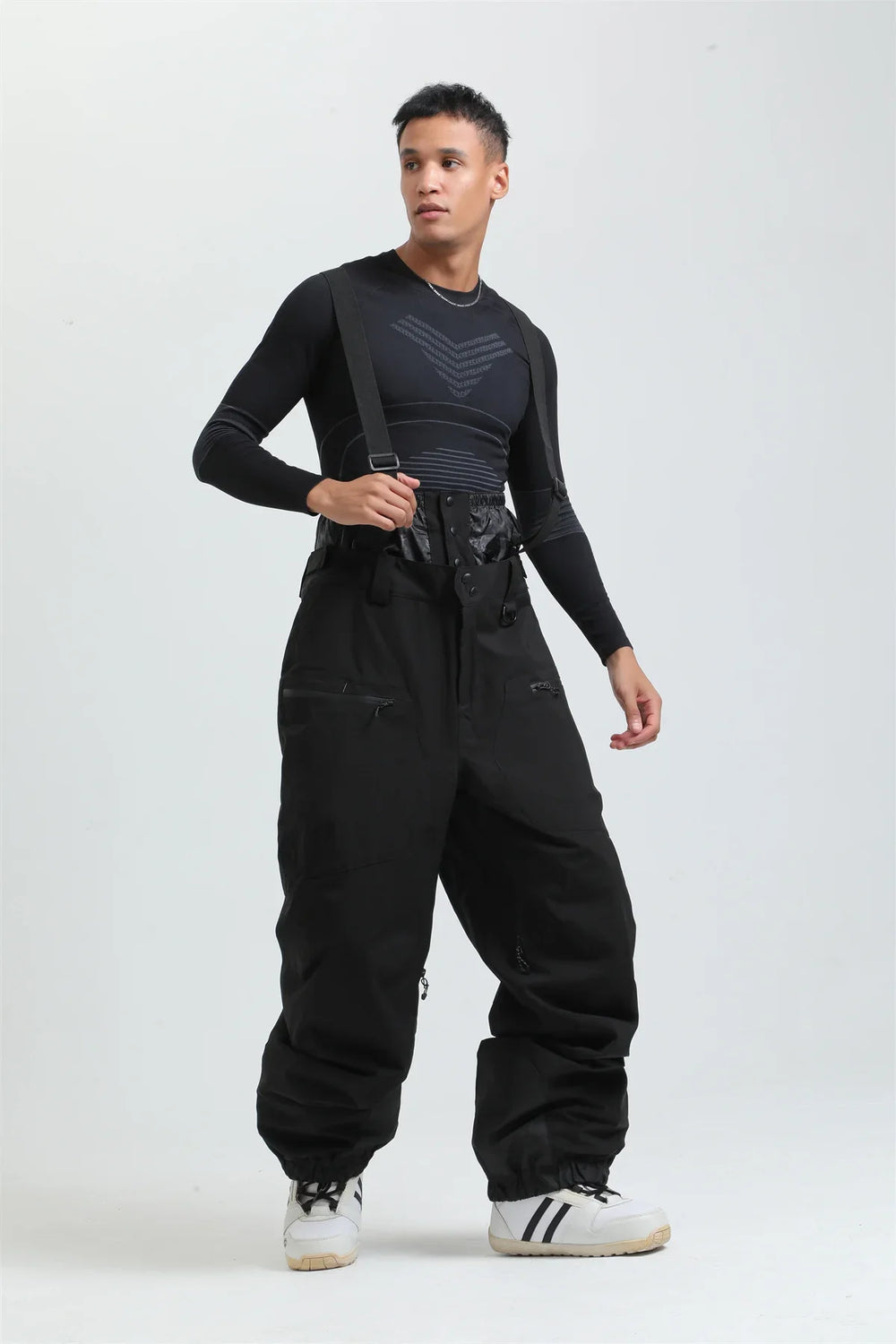 Robuste wasserdichte Thermohose für Herren & Damen, mit Hosenträgern für optimalen Kälteschutz beim Skifahren.