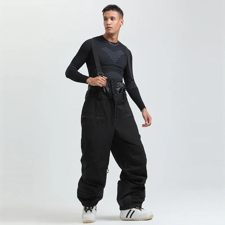 Flexible Unisex Schneeoverall Hose mit Hosenträgern, wasserdicht & warm, perfekt für jede Winteraktivität.