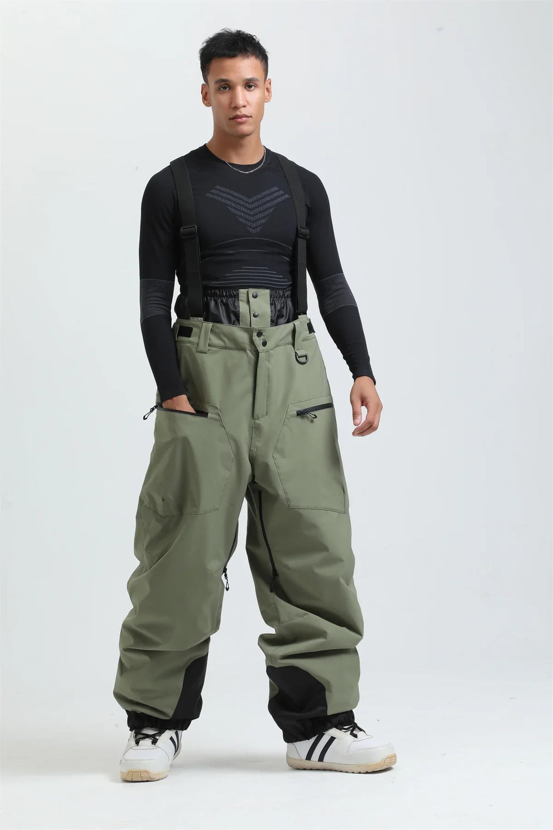 Vielseitige Unisex Skihose mit verstellbaren Hosenträgern, wasserdicht & extrem warm für Ski und Snowboard.
