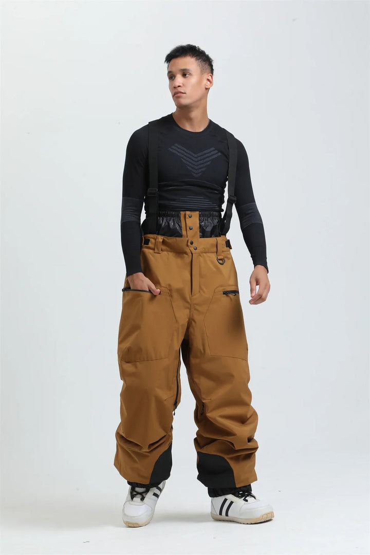 Funktionelle Unisex Outdoorhose mit Hosenträgern, wasserdicht und atmungsaktiv, ideal für Ski & Winter.