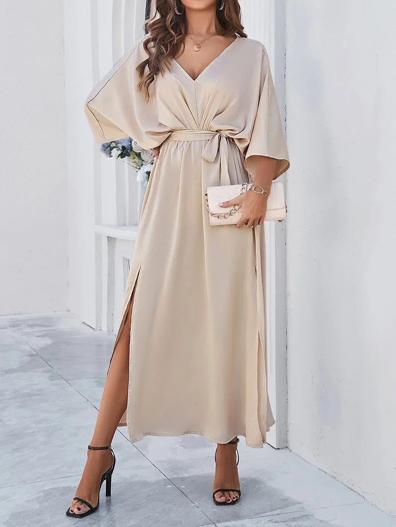 Elegantes Damen Wickelkleid in Midilänge mit V-Ausschnitt und Seitenschlitz. Stilvolles Sommerkleid für viele Anlässe.