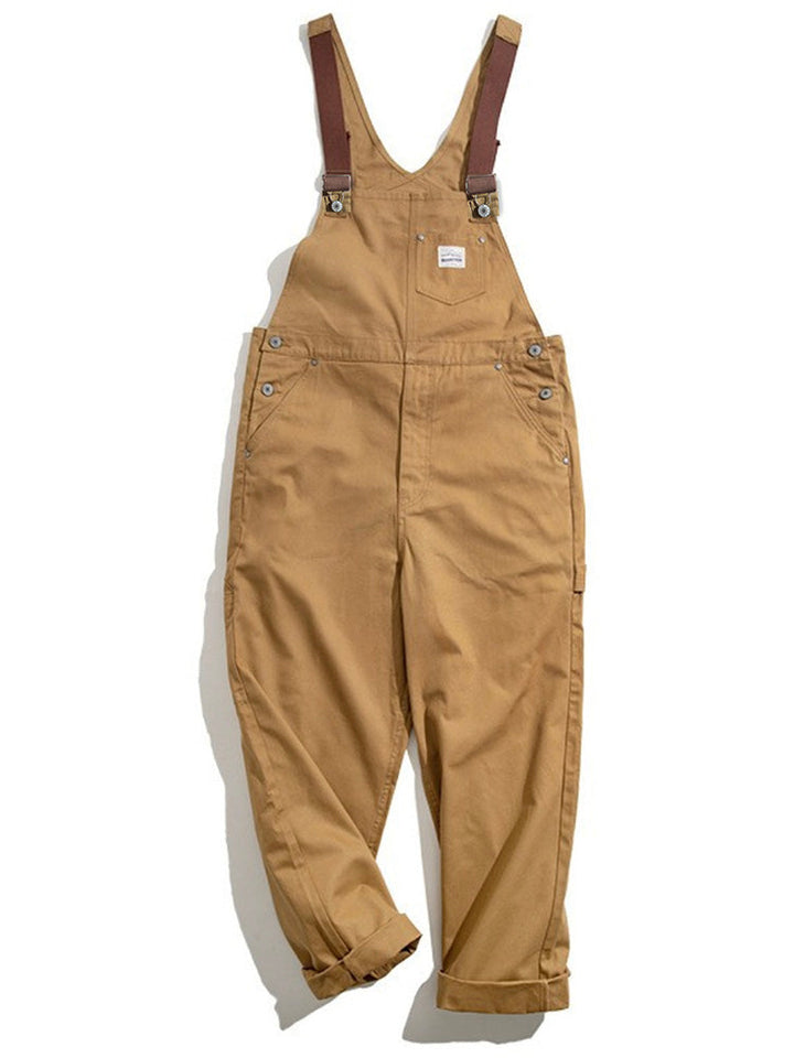 Vintage Herren Latzanzug aus robustem Duck-Bib-Stoff, ideal für Arbeit & Freizeit.