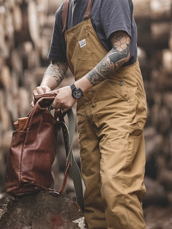 Strapazierfähiger Duck-Bib Overall für Handwerker, braun, mit viel Stauraum.
