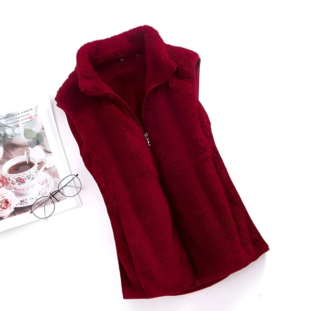 Elegante Damen Fleece Weste mit hohem Kragen, schützt vor Wind und Kälte.
