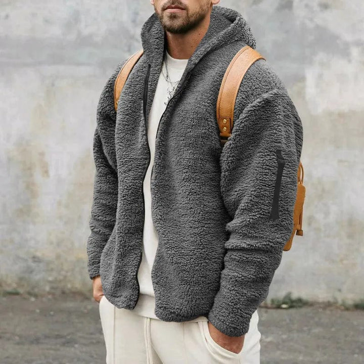 Bequeme Herren Fleecejacke mit Kapuze, windabweisend und warm. Perfekte Winterkleidung für jeden Tag.