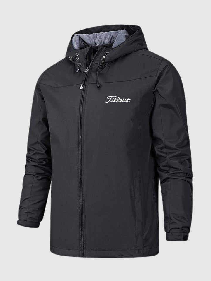 "Wasserdichte Damenjacke in Blau mit Kapuze, modernes Design, ideal für Regen und Wind, hoher Tragekomfort."