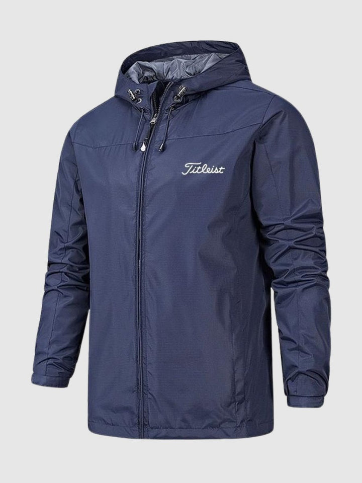 "Wasserdichte Damenjacke in Blau mit Kapuze, modernes Design, ideal für Regen und Wind, hoher Tragekomfort."