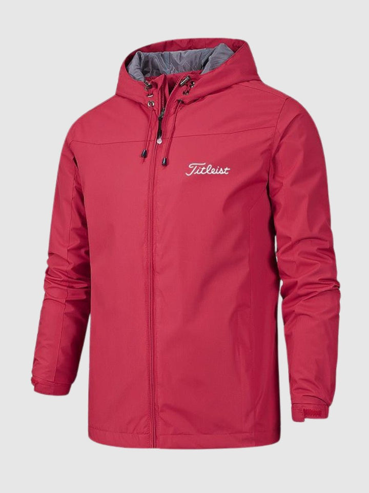 "Wasserdichte Damenjacke in Blau mit Kapuze, modernes Design, ideal für Regen und Wind, hoher Tragekomfort."