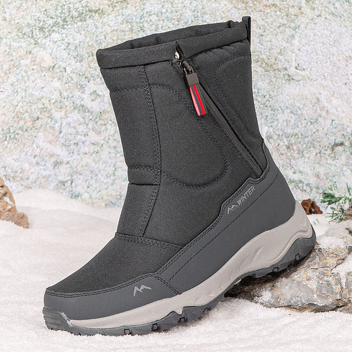Robuste, wasserdichte Winterstiefel für Damen, gefüttert, rutschfest und leicht anzuziehen dank Reißverschluss.