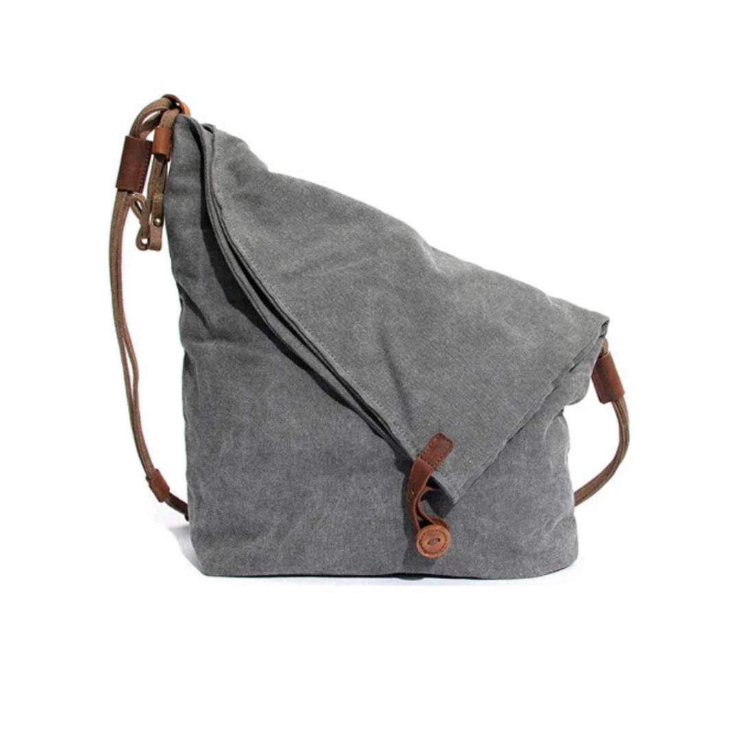 "Weiche, stilvolle Schultertasche mit Reißverschluss und geräumigem Inneren in Grau für Damen, ideal für Alltag und Abend."