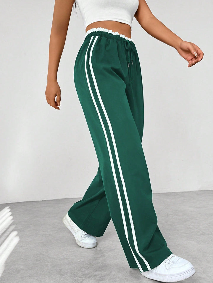 Vielseitige Sporthose für Damen mit weitem Bein; perfekt für Fitness, Freizeit & urbanen Look.