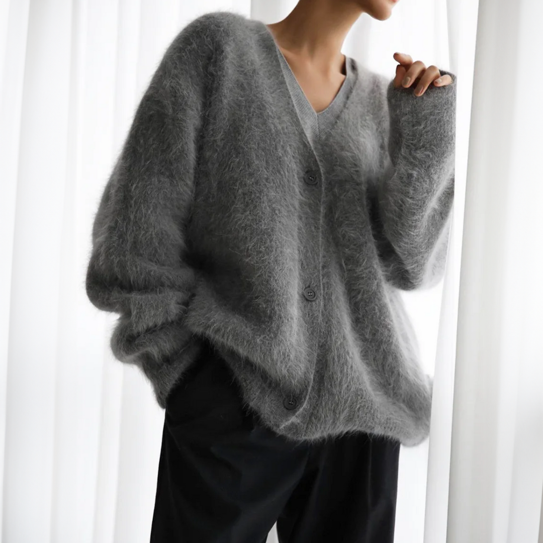 Stilvolle Damen Cardigan, wendbar, mit einzigartigem Kuhmuster, perfekt für Herbstlooks.